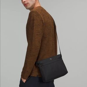 Brand new, never worn black Lululemon cross body bag. Perfect size!